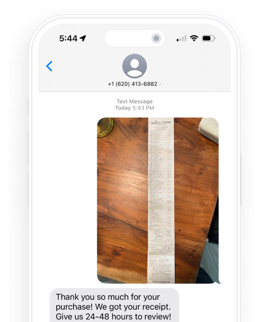 Photo of a Whole Foods receipt in a text thread, with a reply that the receipt was received